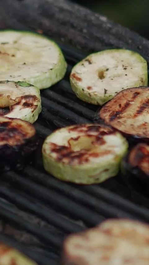 Steak meat is fried on fire and smoke. Barbecue grill with smoke on coals Stock Footage 322790937