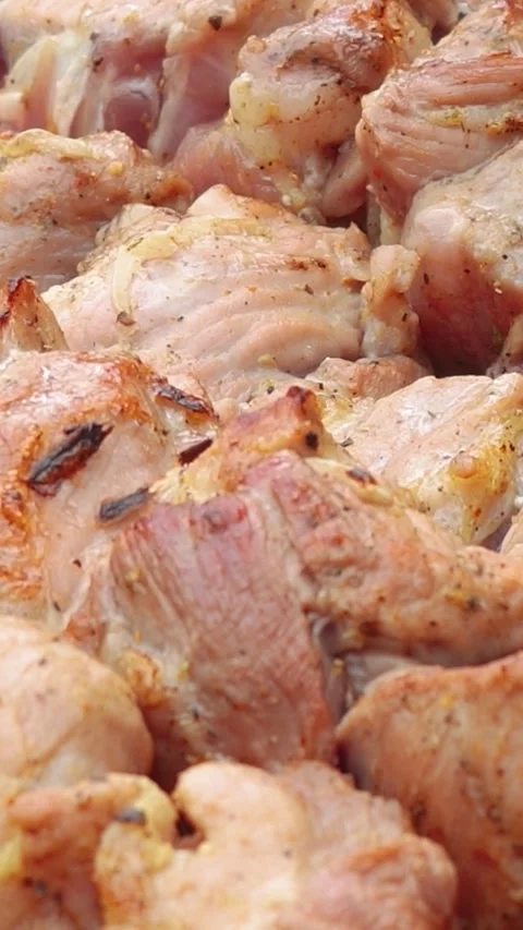 Steak meat is fried outside on fire and smoke. Barbecue grill with smoke Stock Footage 304807203