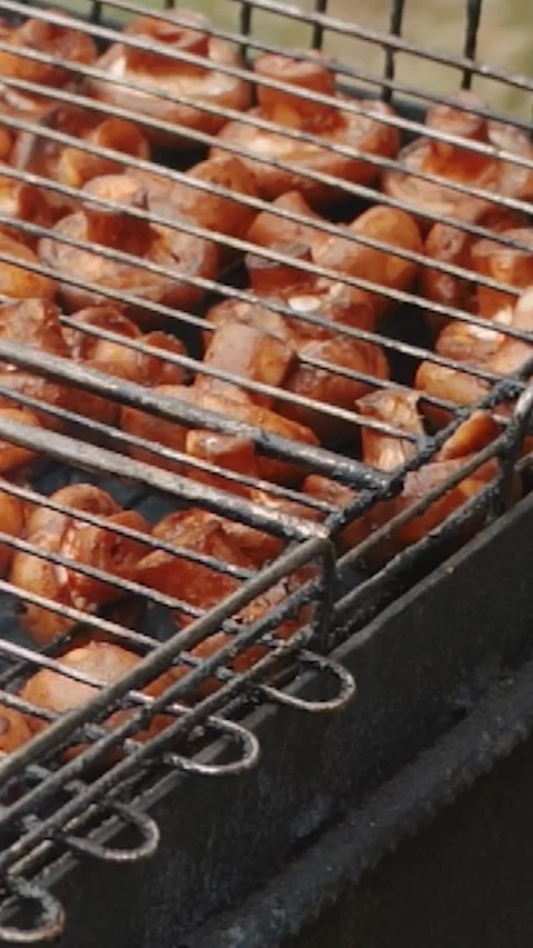 Steak meat is fried outside on fire and smoke. Barbecue grill with smoke Stock Footage 304807924