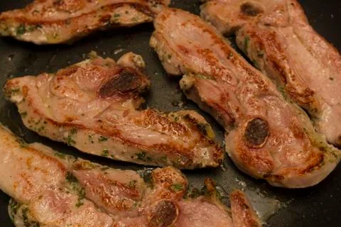 Steak meat grilled on pan Stock Photos