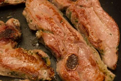 Steak meat grilled on pan Stock Photos
