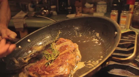 Steak In Pan Rosemary 2 Stock Footage 54761617