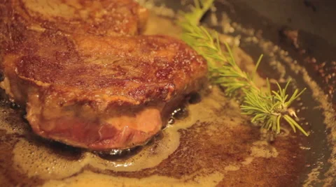 Steak In Pan Rosemary Stock Footage 54761782