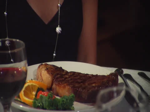 Steak peppered on command at table, static Stock Footage 26191663