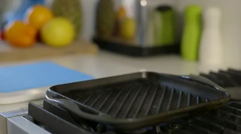 Steak placed in pan Stock Footage 22041027