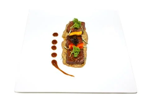 Steak plate with mashed eggplant Stock Photos