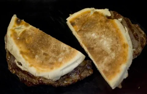 Steak on Portuguese bread  Stock Photos
