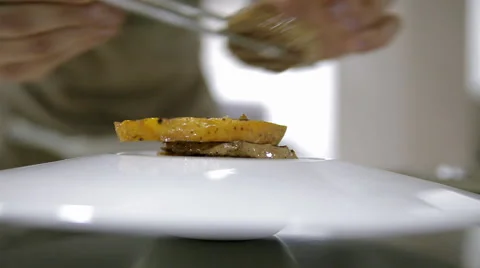 Steak with potatoes on a dish Stock Footage 58065611