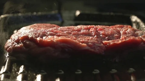Steak professional cooking on grill by chef in restaurant Stock Footage 71616641