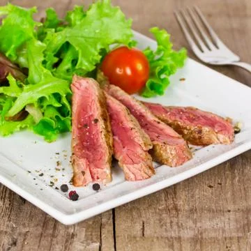 Steak with salad Foto stock