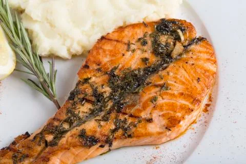 Steak salmon fish with mashed potatoes. Stock Photos