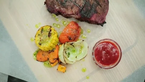 Steak sauce and vegetables close-up Stock Footage 71803381