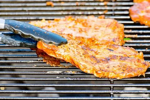 Steak is served on the grill Stock Photos