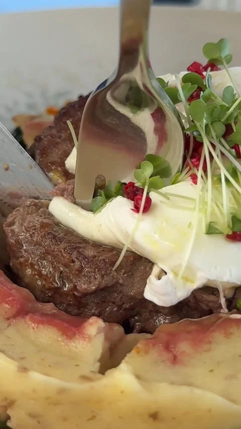 Steak with Truffle Mashed Potatoes and Poached Egg potato pillow poached egg Stock Footage 323285545
