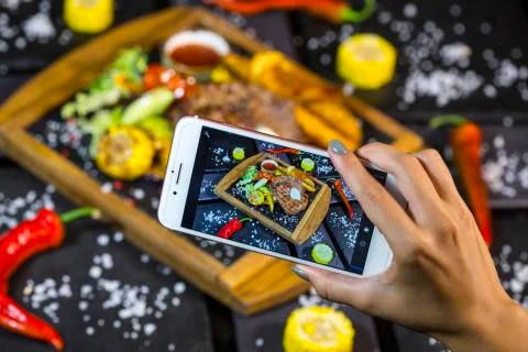 Steak with vegetables. Medium roast meat steak from pork, beef on the board Stock Photos