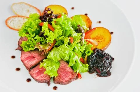 Steak &amp; vegetables Stock Photos