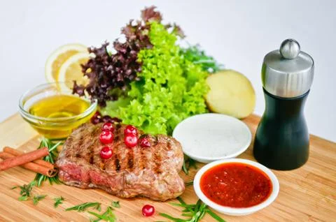 Steak &amp; vegetables Stock Photos