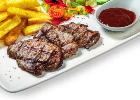 Steak with vegetables Stock Photos