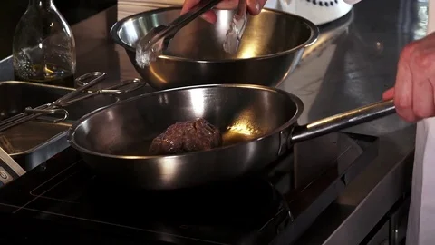 Steaks are cooked in a skillet Видео 82280111