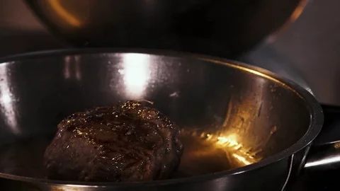Steaks are cooked in a skillet Stock Footage 82281090