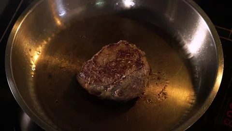 Steaks are cooked in a skillet Stock Footage 82286439