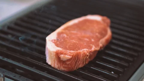Steaks are grilled Stock Footage 105319821