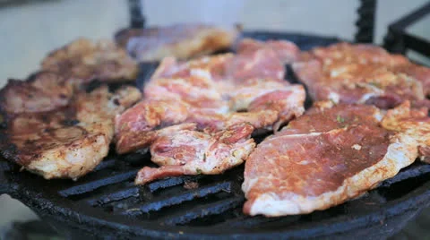 Steaks on barbecue grill Stock Footage 22559885