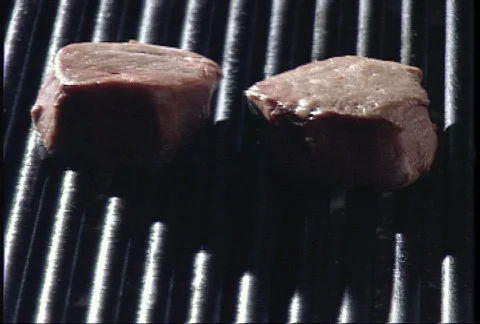 Steaks on a grill 02 Stock-Footage 145250
