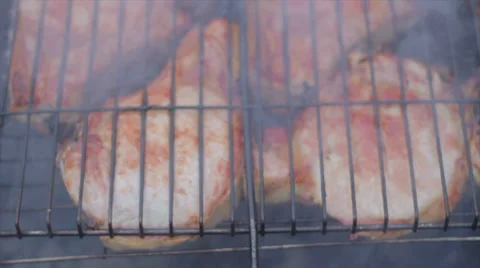 Steaks on grill  Stock Footage 38088234
