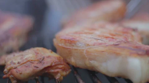 Steaks on grill Stock Footage 38103357