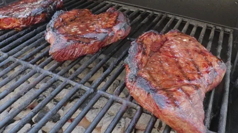 Steaks on the grill Stock Footage 91076747