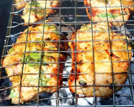 Steaks on the grill Stock Photos