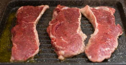 Steaks in the pan Stock-Fotos