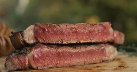 Steaks on shot with selective focus Juicy medium Beef Stock Photos