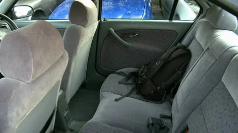 Stealing backback out of car - HD Stock Footage 22085451