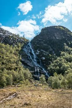 The Steall Falls waterfall cascading down a rugged mountain in Glen Nevis Stock Photos