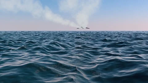 Stealth Fighter Jet Flying Over Water With Vapor Trail Stock Footage 52082232