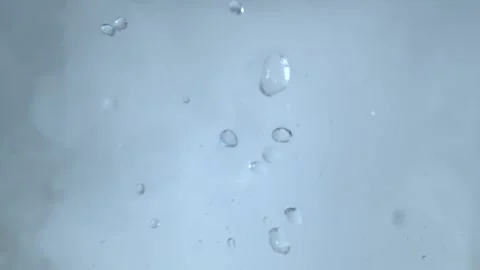 Steam and water droplets. Splashes of water and fog. Smoke and water bubbles Stock Footage 172199573