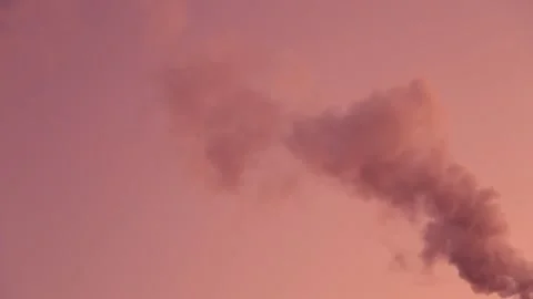 Steam on the background of the crimson evening sky Stock Footage 143107529