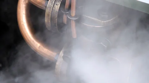 Steam being released, Tenterden, Kent, England, United Kingdom Stock Footage 36579943