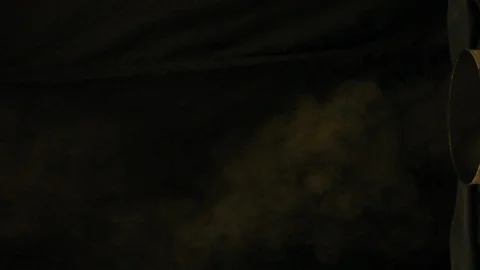 Steam Blows In Front Of Black Sheet Stock Footage 106674407