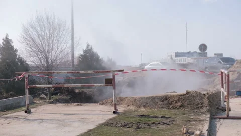 Steam from a broken sewer utility line. 스톡 동영상 86993644