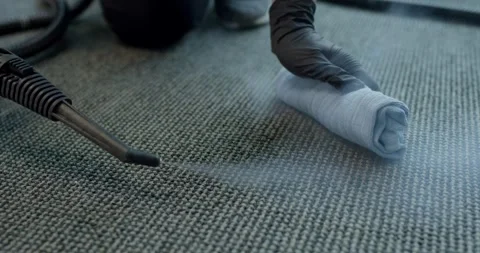 Steam Cleaner Nozzle Cleaning Textured Carpet In Intense Closeup Stock Footage 340273855