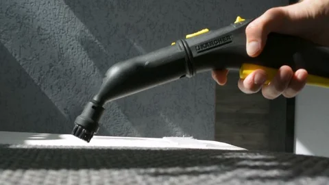 Steam cleaning a sofa with Karcher device. Home cleaning concept. 스톡 동영상 92193083