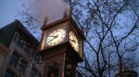 Steam Clock Framed By Light Decorated Festive Tree Stock Footage 19193456