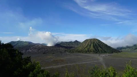 Steam clouds coming out from Mount Bromo Stock Photos
