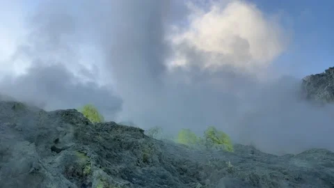 Steam clouds rising from active volcano vents Stock Footage 221888179