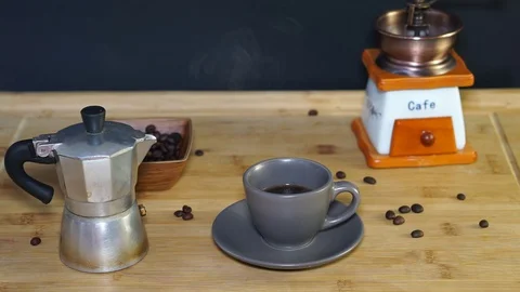 Steam comes out with a cup of hot coffee Stock Footage 104718416