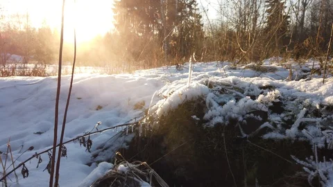 Steam comes from snow covered winter at sunset Stock Footage 124374792