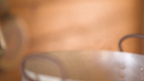 Steam coming out from pan in kitchen at home Stock Footage 76097573